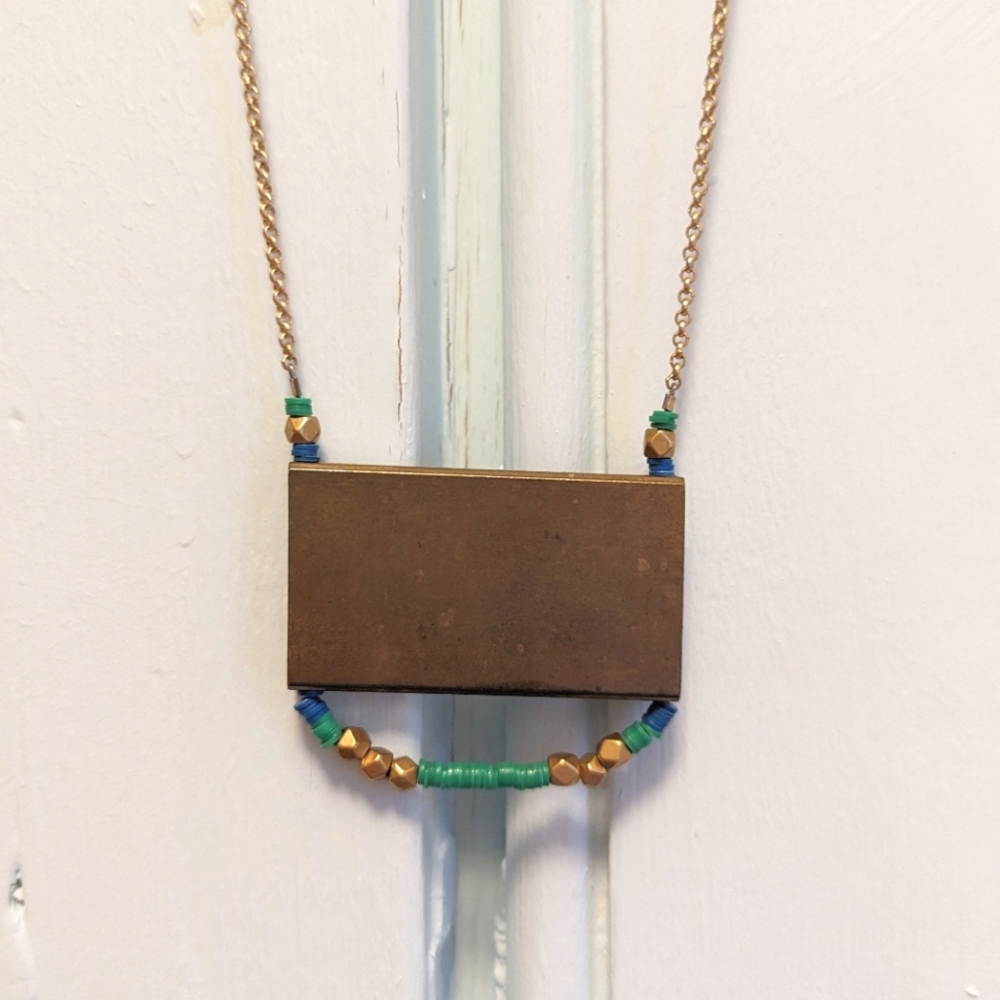 Larissa Loden brass geometric necklace